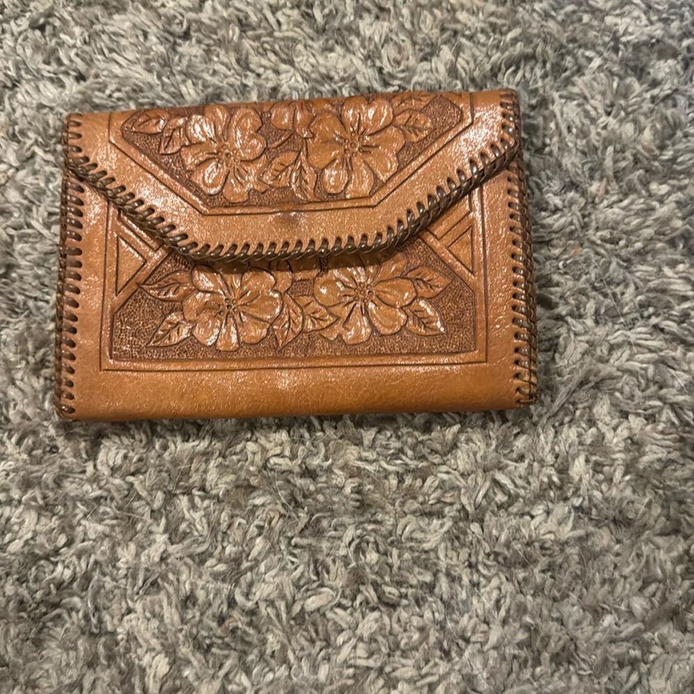 Vintage tooled leather clutch